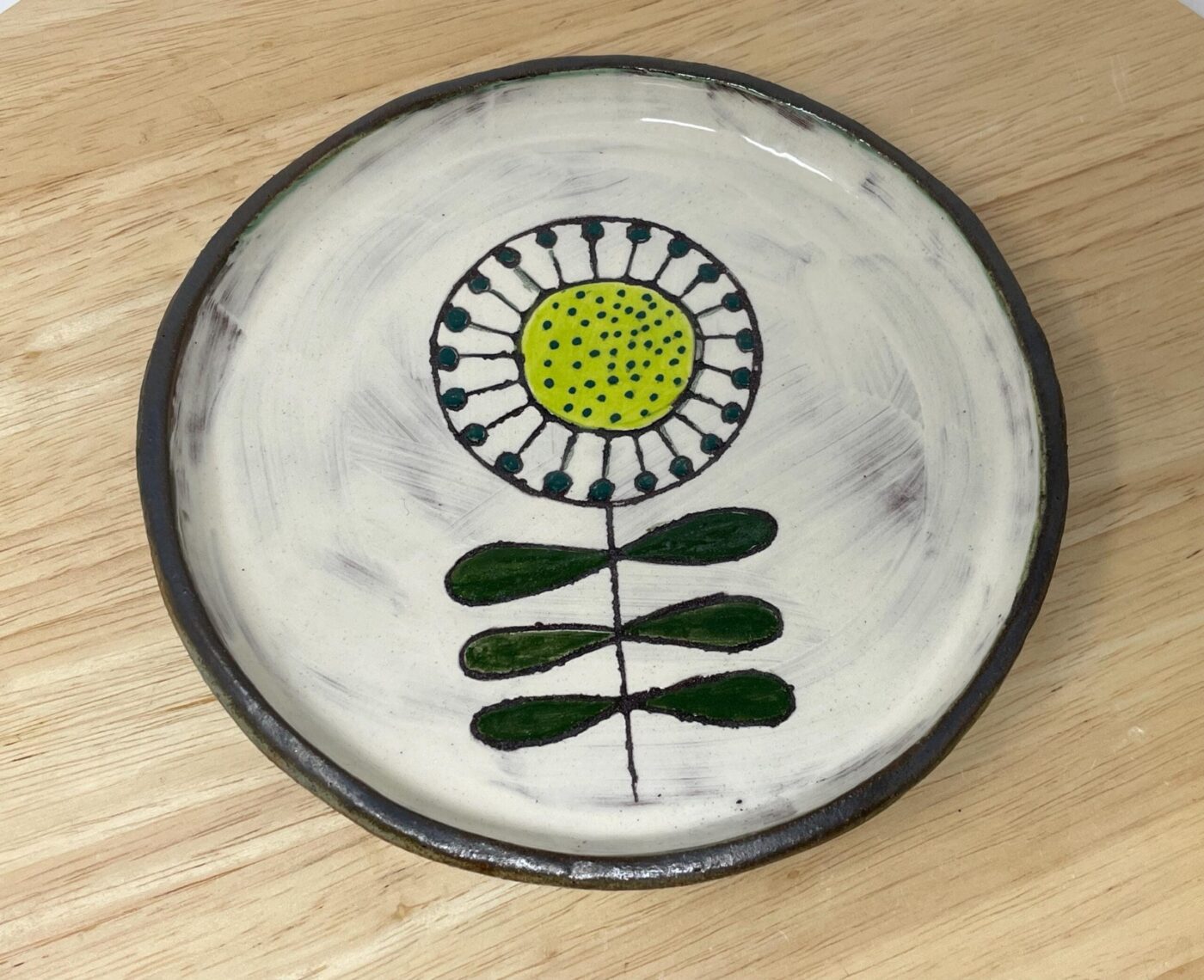 Graphite rim detail on handmade folk art ceramic plate — Fabode Ceramics Scotland