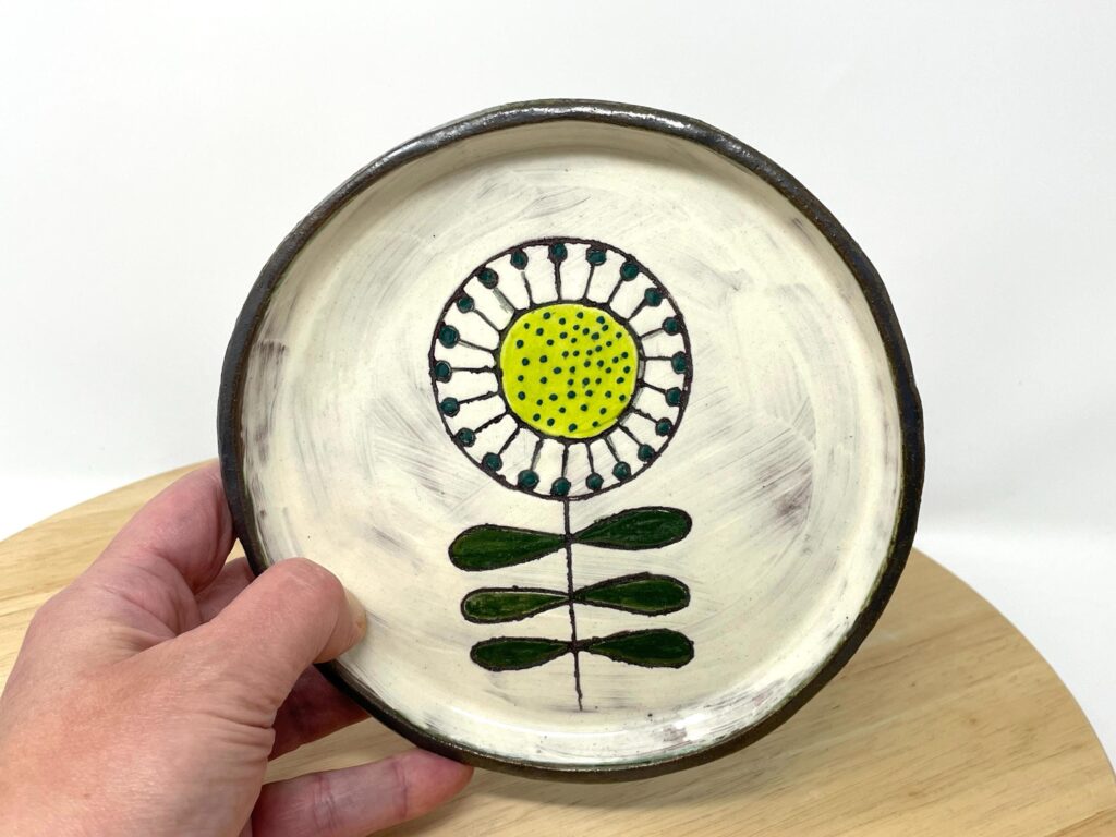 Folk art sunflower ceramic plate — handmade terracotta — Fabode Ceramics Scotland
