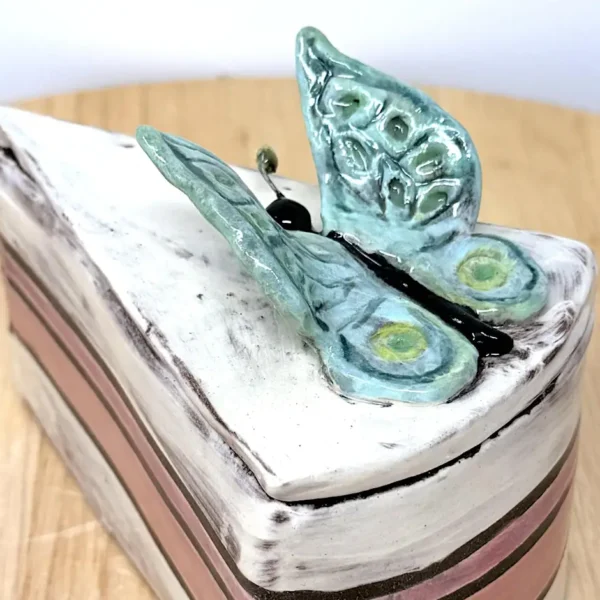 Hand-built ceramic cake slice with butterfly lid, made in Marta's Edinburgh studio
