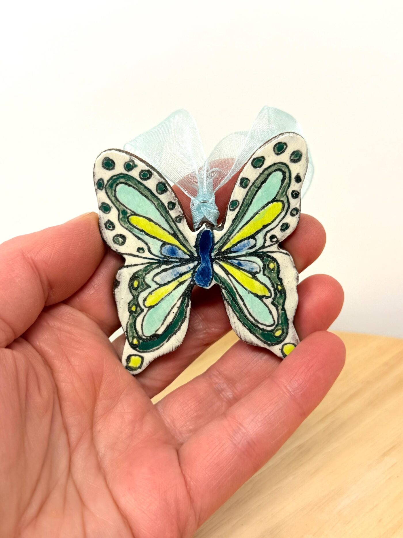 il_fullxfull.7783367285_jmwb.jpg Handmade Ceramic Butterfly Ornament – Scandinavian Folk Art Wall Hanging, Terracotta Decor (1 of 13) -- Fabode Ceramics