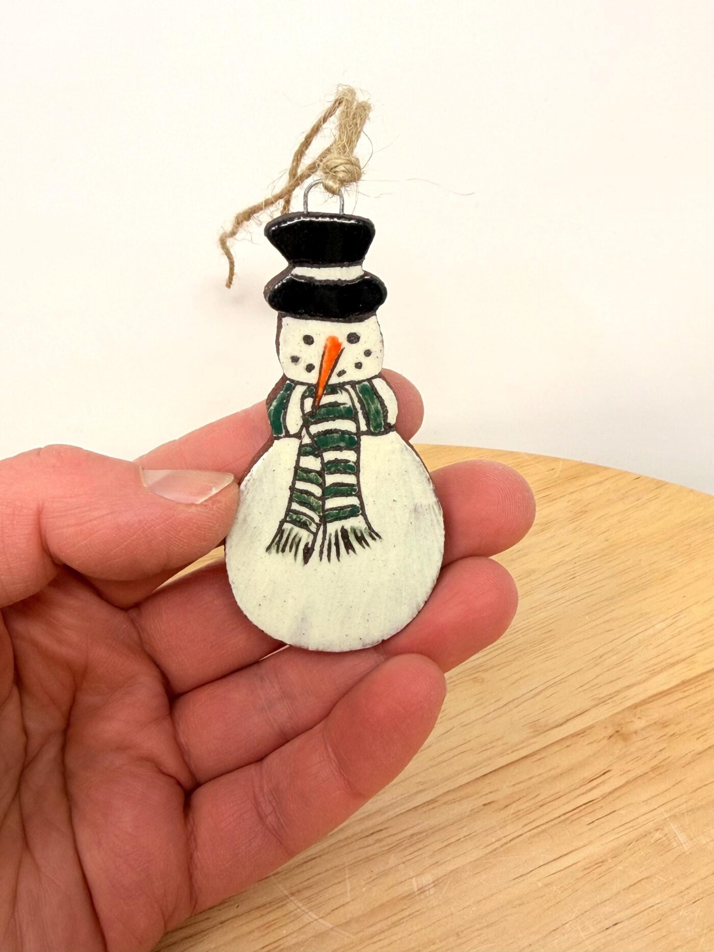 il_fullxfull.7804999703_lyjh.jpg Hand-Painted Ceramic Snowman Ornament – Terracotta Clay Christmas Decoration (1 of 6) -- Fabode Ceramics